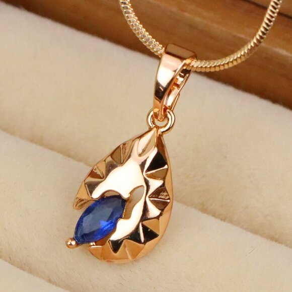 "Teardrop Blue Stone Pendant with Textured Gold Plated Leaf Design, XPPT1721 - Picture 1 of 13